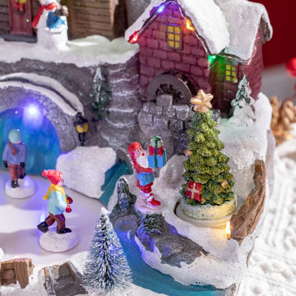 Weihnachtsdorf mit beweglichen Figuren und 21 bunten LEDs
