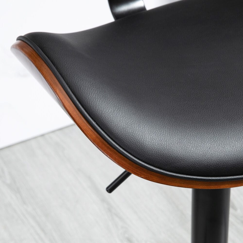 Barhocker höhenverstellbar Kunstleder mit Drehfunktion Schwarz – Produktfoto zeigt modernes Design, hochwertige Materialien und funktionale Eigenschaften ideal für Wohn- oder Arbeitsbereiche. Perfekt als Einrichtungsinspiration oder zur Produktpräsentation in einem Onlineshop.