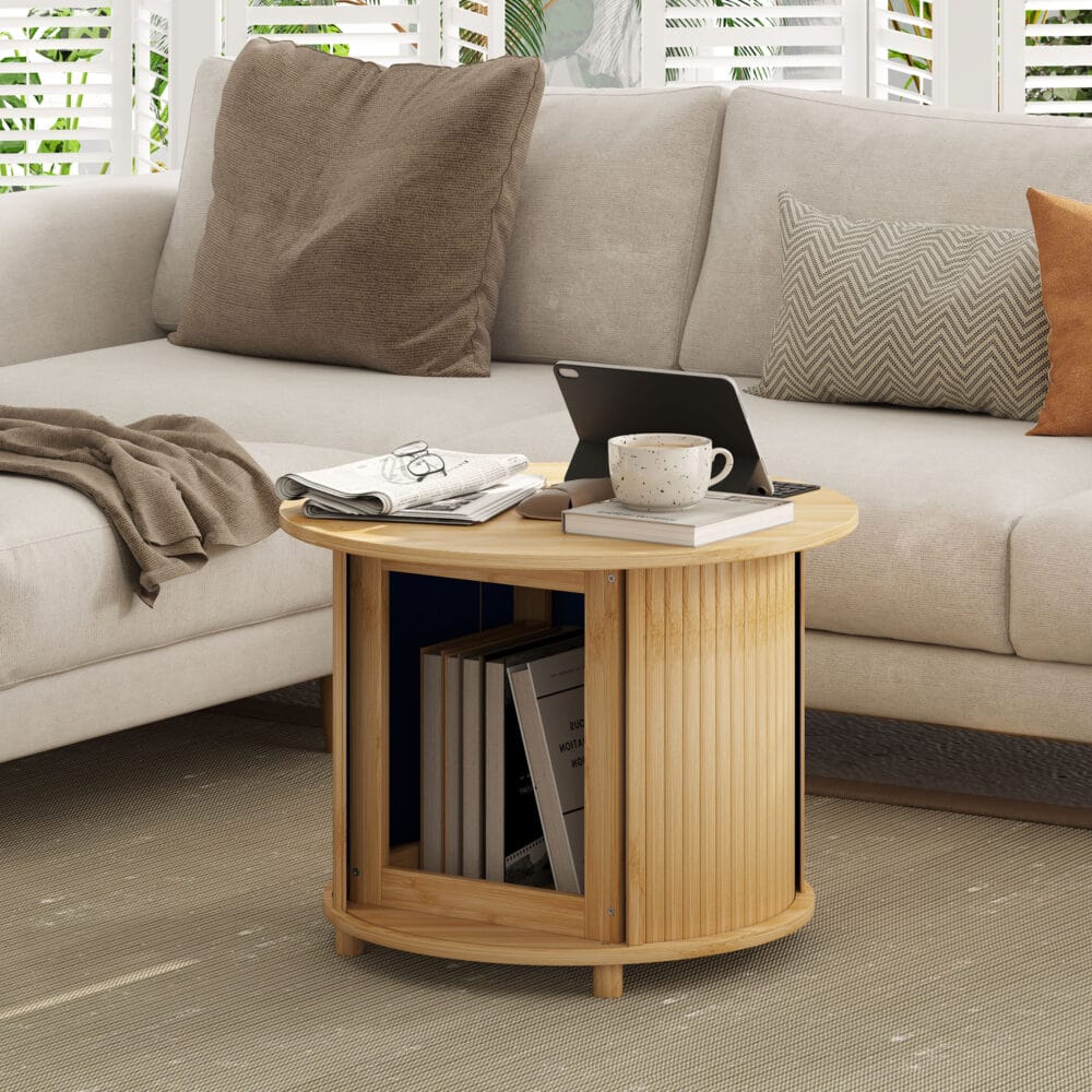 Couchtisch rund aus Bambus mit verstecktem Stauraum Ø60x45cm Natur – Produktfoto zeigt modernes Design, hochwertige Materialien und funktionale Eigenschaften ideal für Wohn- oder Arbeitsbereiche. Perfekt als Einrichtungsinspiration oder zur Produktpräsentation in einem Onlineshop.