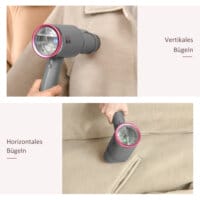 Ein faltbarer Dampfglätter und Handdampfer in Grau und Rosa mit 1520W Leistung.