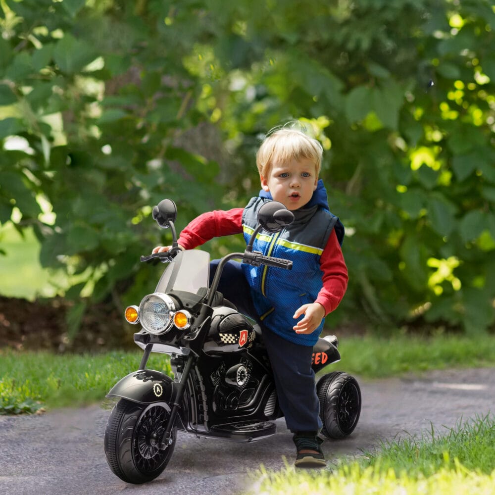 Schwarzes 6V Elektro-Motorrad für Kinder mit LED-Scheinwerfern, ideal für Kinder von 3-6 Jahren. Ein realistisches Fahrerlebnis bei Tag und Nacht.