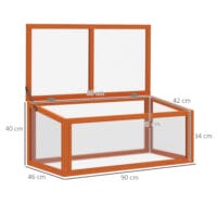 Wetterfestes oranges Frühbeet aus Holz und Polycarbonat, schützt Pflanzen vor Witterungseinflüssen und fördert das Wachstum.