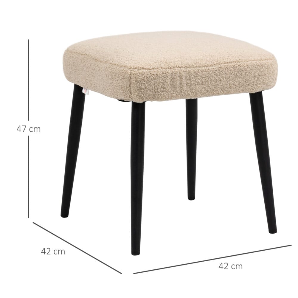 Ein quadratischer Fusshocker in Beige mit Kaschmir-Optik.
