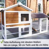 Stabiler Holzhasenstall mit Freigehege für gesunde Bewegung der Tiere.
