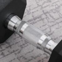 Schwarze Hexagon Kurzhantel 125kg aus Gusseisen mit Gummiüberzug, rutschfest und bodenschonend für Krafttraining.