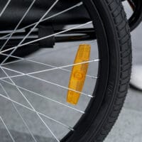 Roter Hundeanhänger klappbar als Fahrradanhänger, wasserbeständig, für den Transport von Haustieren.