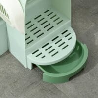 Grünes Katzenhaus mit integrierter Katzentoilette, zwei Bodenwannen und Haube, eine praktische All-in-One-Lösung.