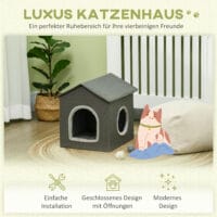 Graue Katzenhöhle in Hausform mit bequemem Kissen und zwei Türen, bietet einen gemütlichen Rückzugsort für Katzen.