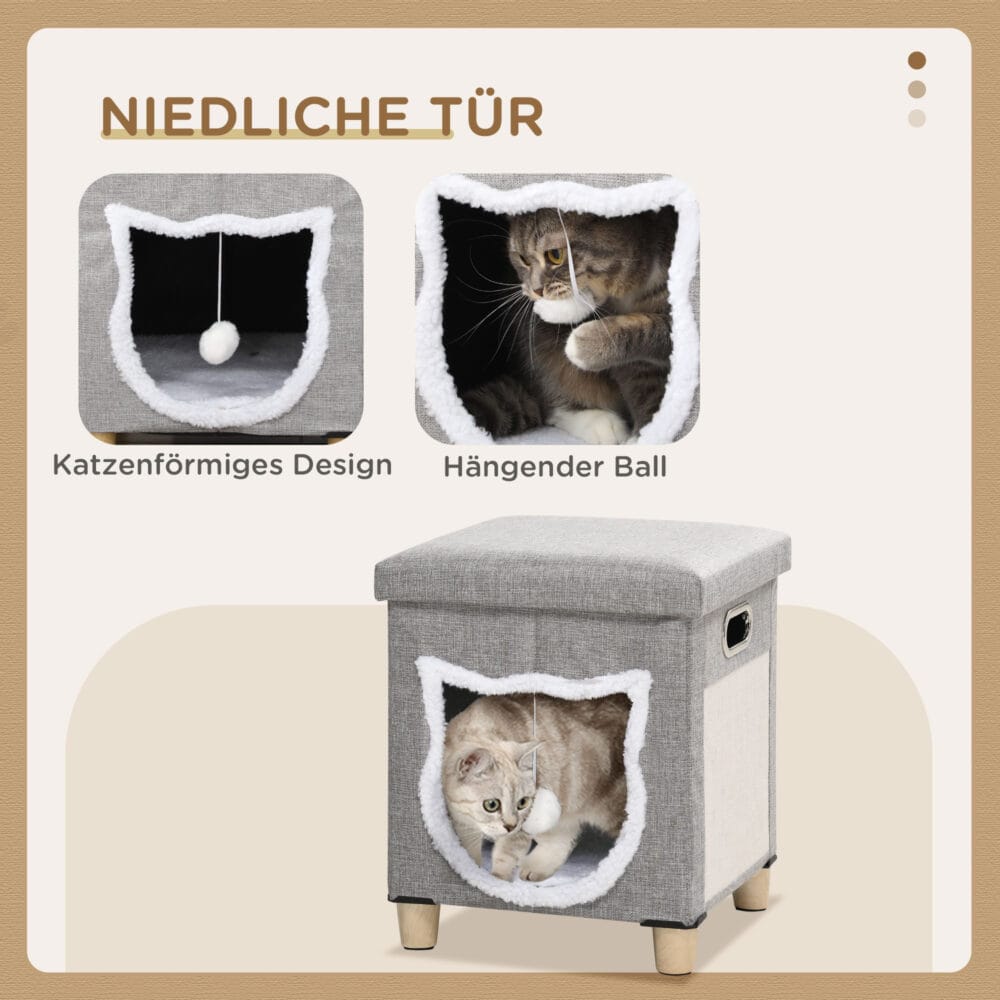 Graue Katzenhöhle mit Kissen, Kratzmatte und Spielball, bietet Komfort und Unterhaltung in einem.