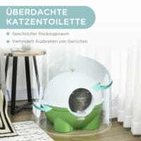Grün-weisses Katzenklo mit Deckel, ideal für den Innenbereich, sorgt für hygienische Sauberkeit.