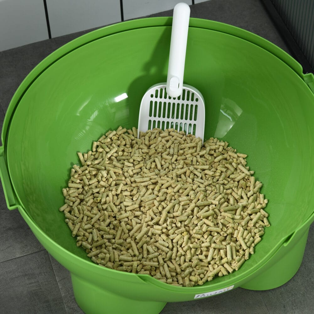 Grün-weisses Katzenklo mit Deckel, ideal für den Innenbereich, sorgt für hygienische Sauberkeit.
