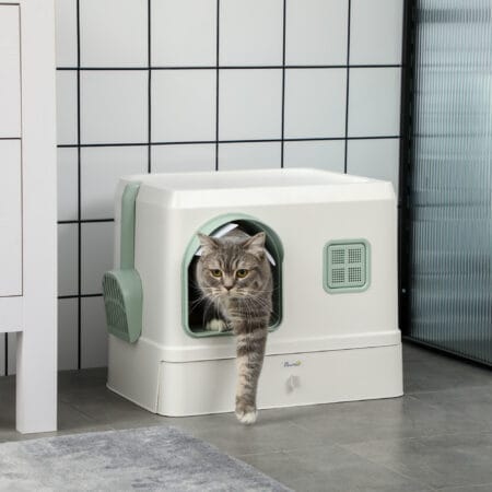 Weiss-grünes Katzenklo mit Schaufel, Schublade und Deodorant, für eine umfassende Hygiene und einfache Wartung.