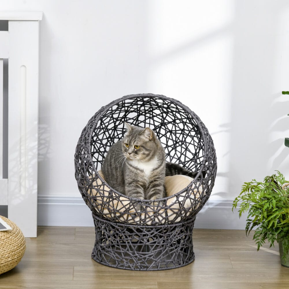 Violett-cremeweisser Katzenkorb mit Kissen, stilvoll und gemütlich, bietet Ihrer Katze einen komfortablen Schlafplatz.