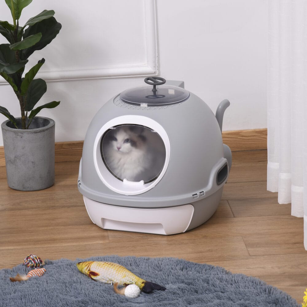Graue tragbare Katzentoilette mit Dachfenster, ideal für Reisen oder flexible Platzierung.