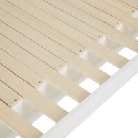 Weisses Kinderbett 90x200 cm mit zusätzlicher Liegefläche.