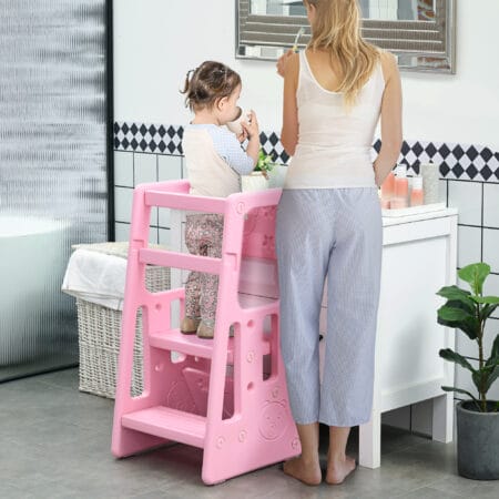 Rosa Kinderleiter Lernturm höhenverstellbar bis 65 kg, Montessori inspiriert für kleine Entdecker und ihre Sicherheit.