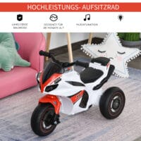 Weisses Kindermotorrad als Rutscherfahrzeug mit Musikfunktion, speziell für Kleinkinder. Es fördert Gleichgewicht und Koordination beim Spielen.