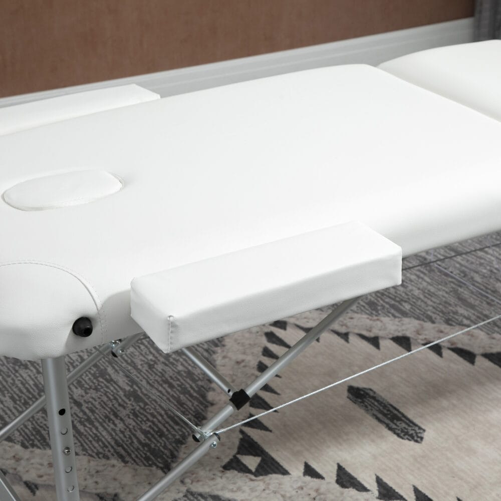 Klappbare Massageliege, höhenverstellbar, perfekt für Spa- und Salonanwendungen, in elegantem Weiss.