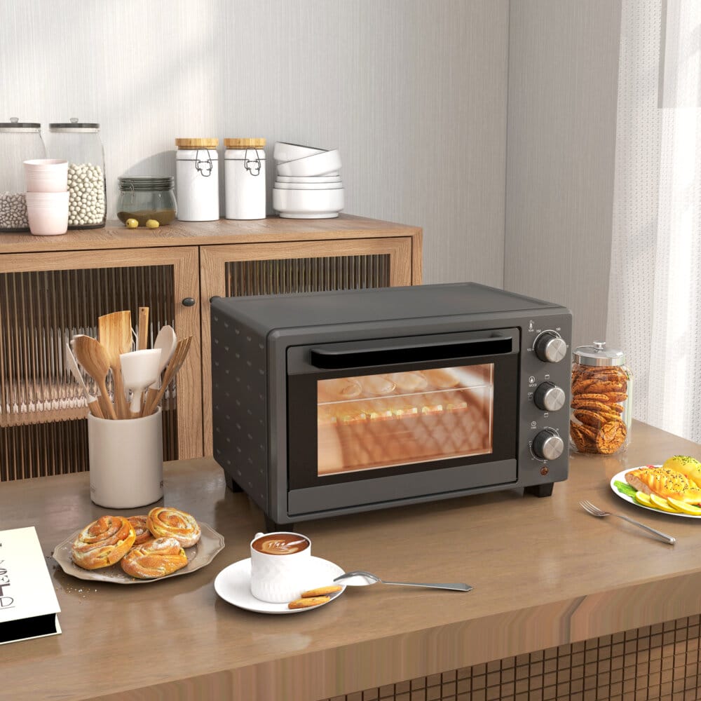 Ein grauer Minibackofen und Ofen mit 21 Litern Fassungsvermögen, 1400W Leistung, Temperaturbereich 100-230 Grad Celsius, Timer und Edelstahl-Zubehör.