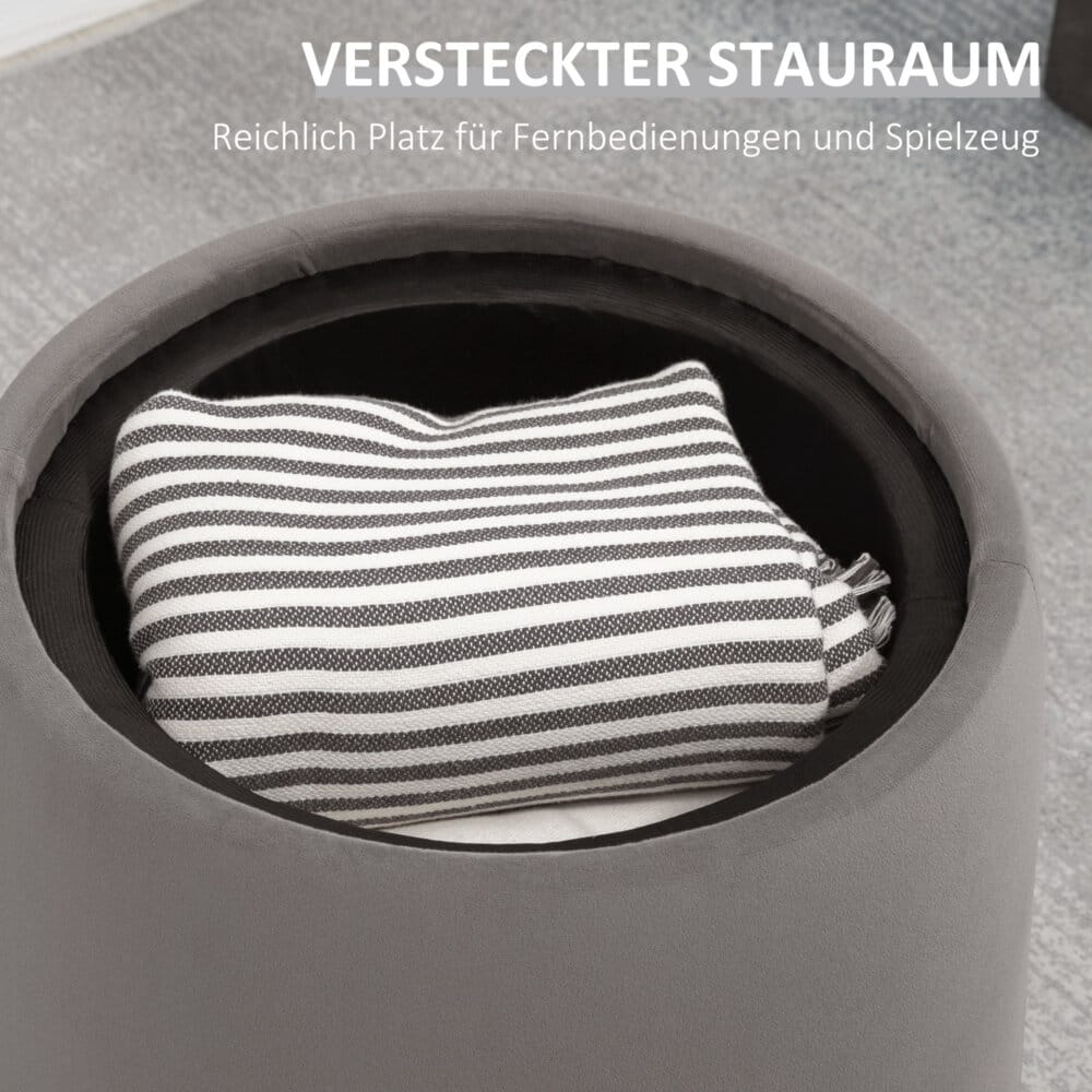 Eine dunkelgraue Ottomane mit Stauraum und 2-in-1 Design in Samtoptik.