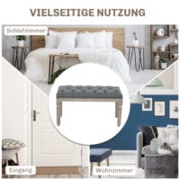 Graue Polsterbank im Vintage-Stil mit eleganter Knopfverzierung. Ein zeitloses Möbelstück für klassische Einrichtungen.