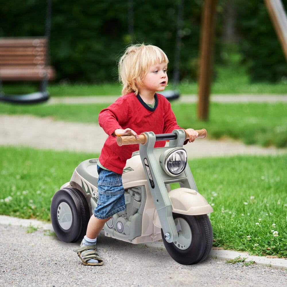 Cremeweisses Rutschauto für Kinder mit Musik und Blasenfunktion, ideal für Kinder von 2-5 Jahren. Ein fantasievolles Fahrzeug für besondere Momente.