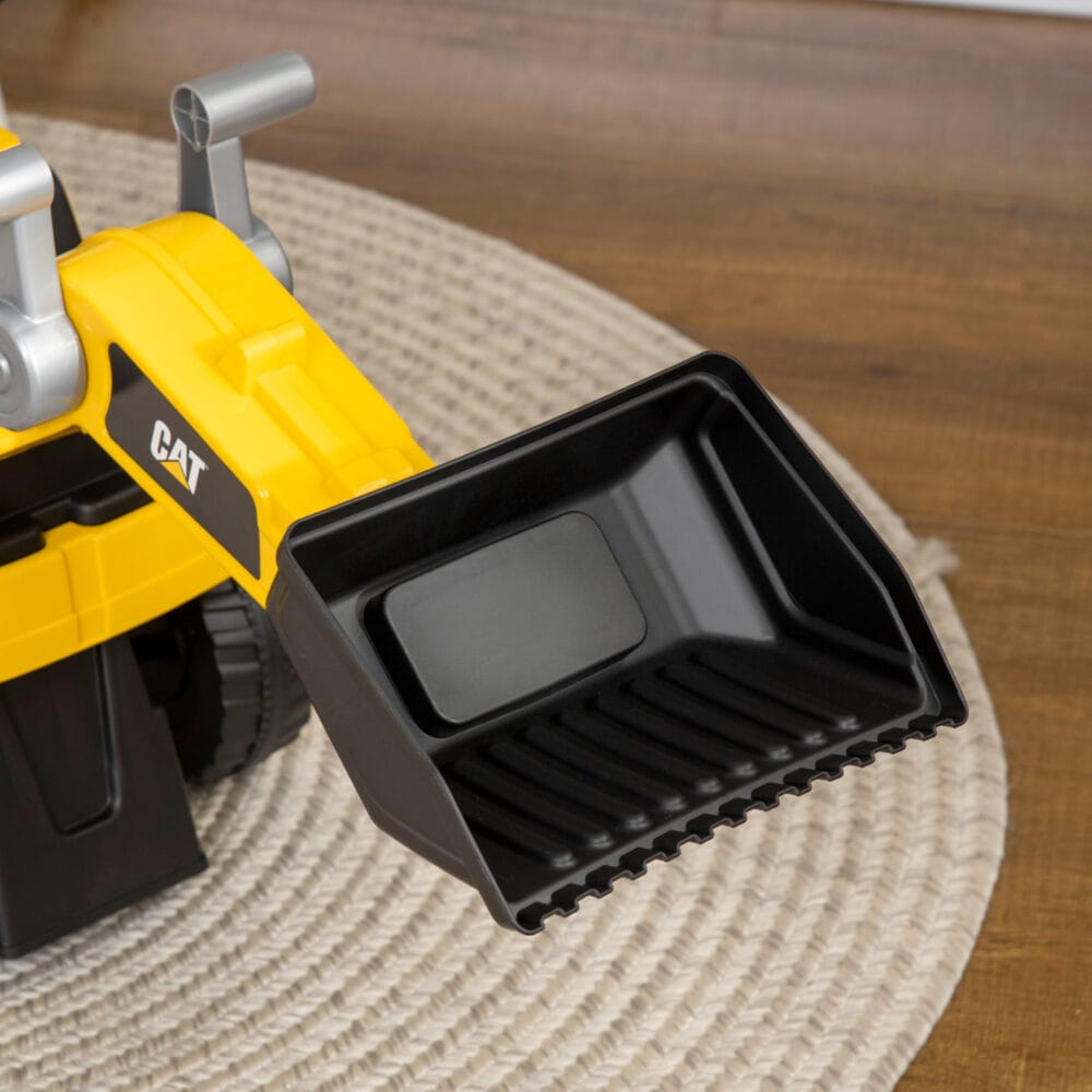 Gelb-schwarzes Rutschauto im Design eines Sitzbaggers mit Hupe, geeignet für Kinder ab 12 Monaten.