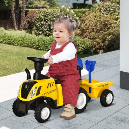 Gelbes Rutschauto im Traktor-Design mit abnehmbarem Anhänger, ideal für Kinder ab 2 Jahren. Perfekt zum Transportieren von Spielzeug und Entdecken.