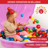 Rosa Muschel-Sandkasten mit klappbarem Deckel zum Schutz vor Schmutz.