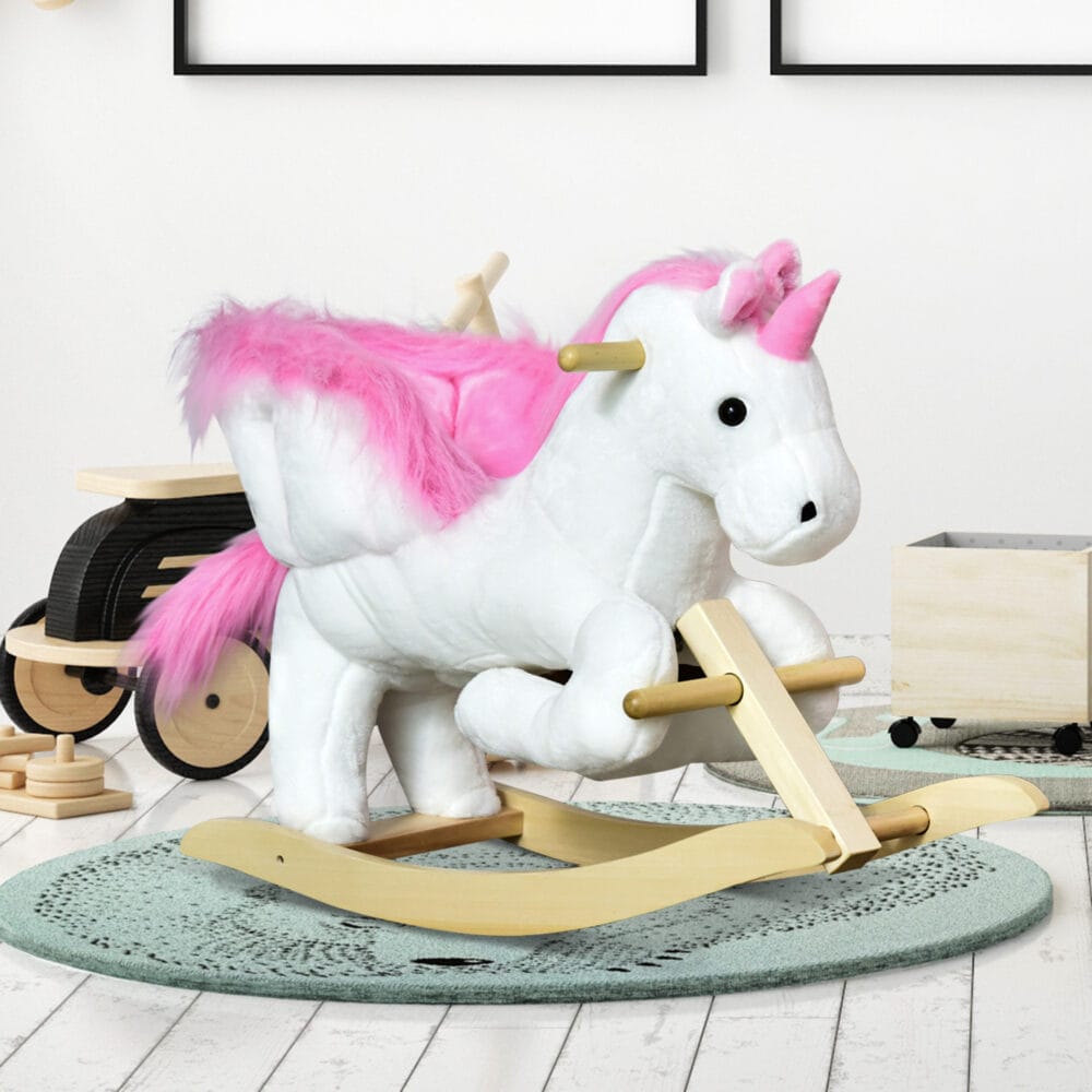 Rosa-weisses klassisches Schaukelpferd, eine bezaubernde Kinderschaukel, die die Balance fördert und fantasievolle Abenteuer ermöglicht.
