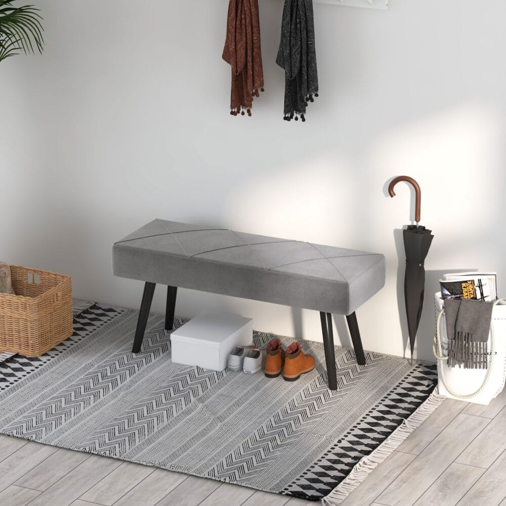 Graue Polsterbank in Samtoptik mit elegantem X-Muster, Masse 100x36x45cm. Bietet Komfort und modernes Design.