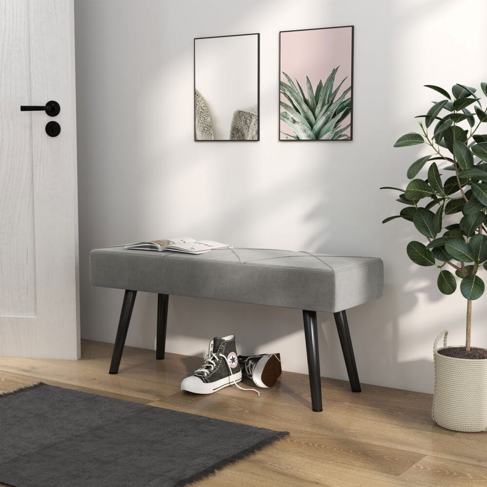 Graue Polsterbank in Samtoptik mit elegantem X-Muster, Masse 100x36x45cm. Bietet Komfort und modernes Design.