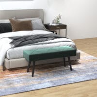 Grüne Polsterbank in Samtoptik mit markantem X-Muster, Masse 100x36x45cm. Eine stilvolle Ergänzung für jeden Raum.