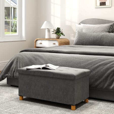 Graue faltbare Sitzbank in eleganter Samtoptik mit geräumigem Stauraum, ideal für kleine Räume und schnelle Verstauung.