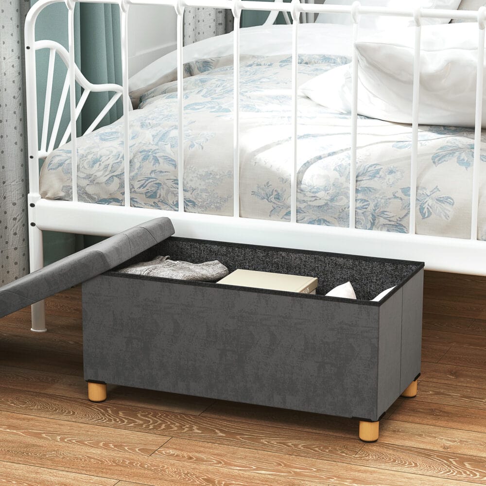 Graue faltbare Sitzbank in eleganter Samtoptik mit geräumigem Stauraum, ideal für kleine Räume und schnelle Verstauung.