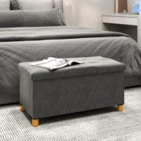 Graue faltbare Sitzbank in eleganter Samtoptik mit geräumigem Stauraum, ideal für kleine Räume und schnelle Verstauung.