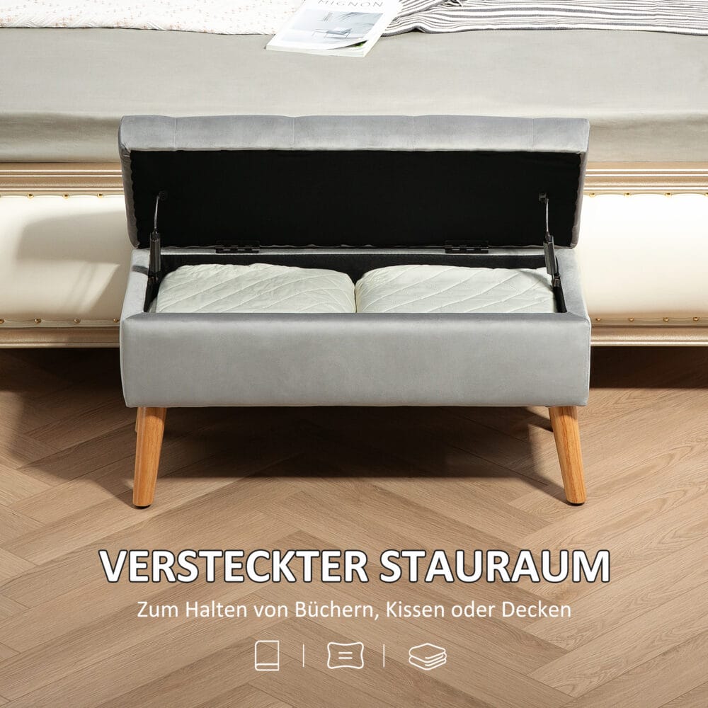Graue Sitzbank mit stilvoller Samtoptik, integriertem Stauraum und Beinen aus massivem Gummiholz, perfekt für moderne Wohnräume.