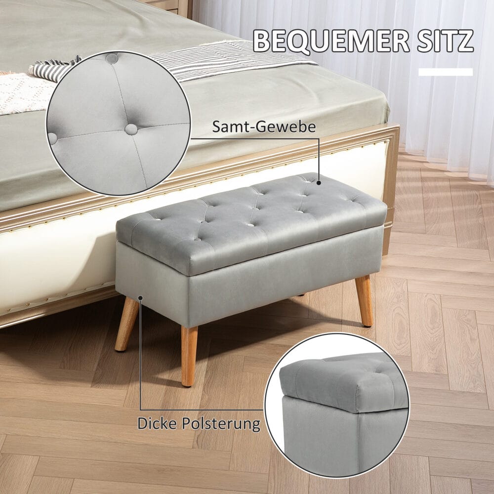 Graue Sitzbank mit stilvoller Samtoptik, integriertem Stauraum und Beinen aus massivem Gummiholz, perfekt für moderne Wohnräume.