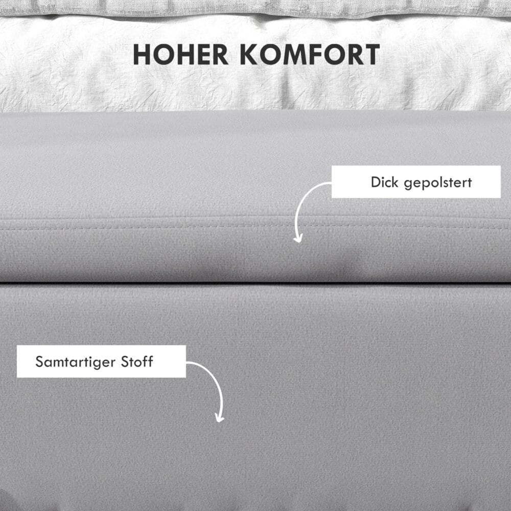 Hellgraue Sitzbank mit integriertem Stauraum, ideal für das Wohnzimmer, um Decken und Kissen ordentlich zu verstauen.