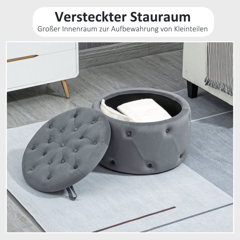 Ein grauer Sitzhocker mit Stauraum in runder Form und Samtoptik.