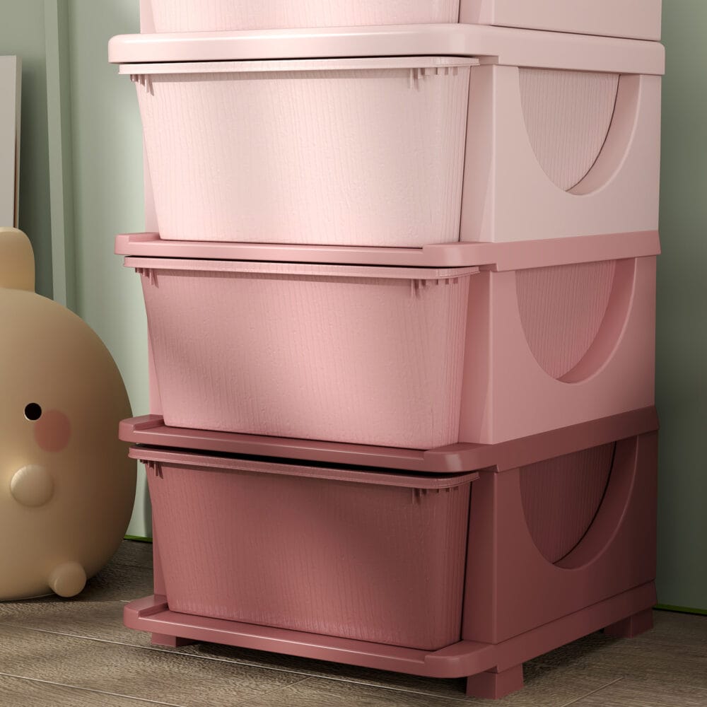 Rosa Spielzeugkommode mit vier offenen Fächern, speziell für das Kinderzimmer entworfen, um Spielzeug und Bastelmaterialien übersichtlich zu organisieren.
