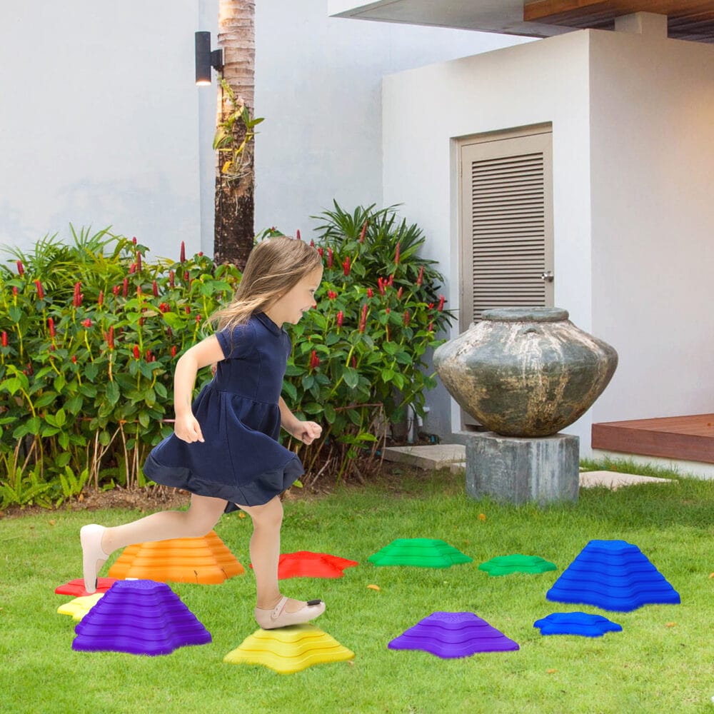 Buntes Stapelspielzeug in Form von Balance-Steinen, bis 80kg belastbar, fördert Koordination und Gleichgewichtssinn bei Kindern.