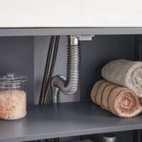 Waschbeckenunterschrank in Vintage Grau mit 60x30x60 cm, stilvolle Optik.