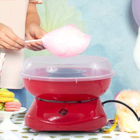 Eine rote Zuckerwattemaschine, ideal für Partys und Veranstaltungen.